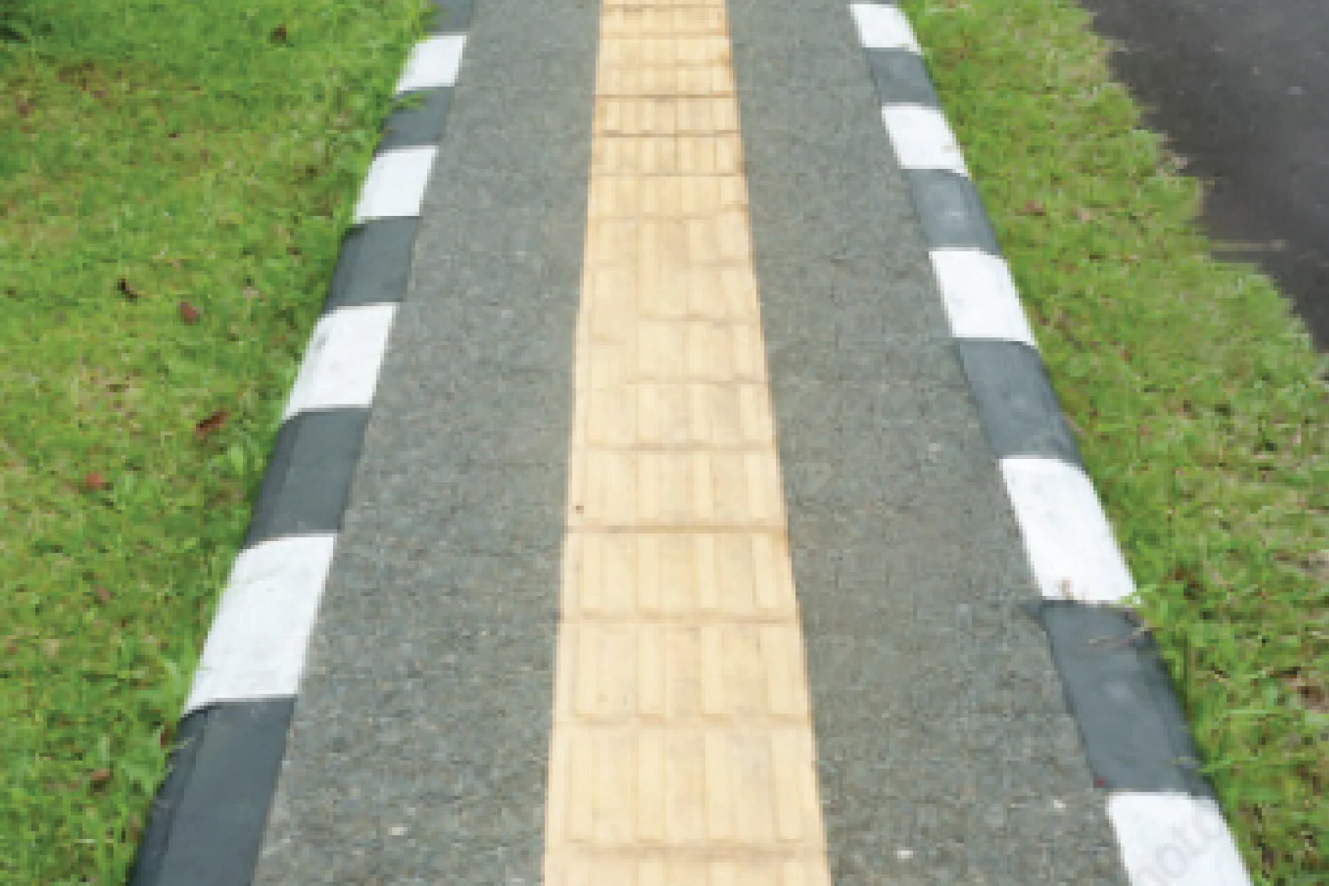 Image of a cement pavementin Qutub valley.