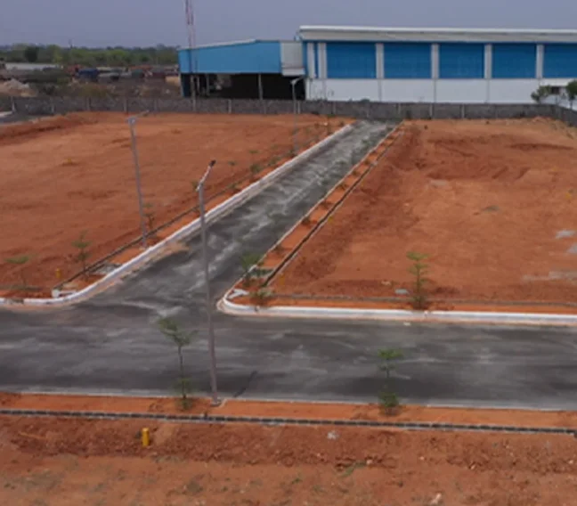 Image of a plot with a road.